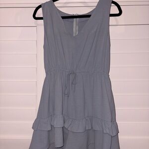 Light Blue Sleeveless Romper with Ruffle Hem